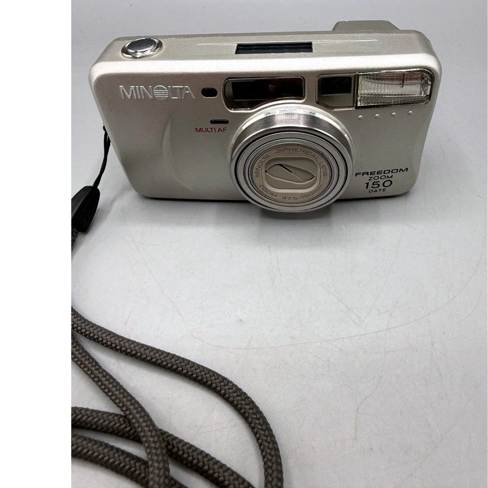 Minolta Freedom Zoom 150 Date 35mm Film Camera Silver 37.5-150mm Multi AF, Works